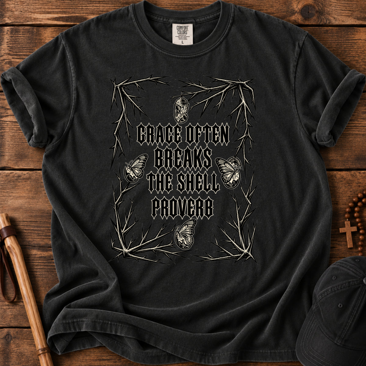 Grace Often Breaks the Shell Tee in Black